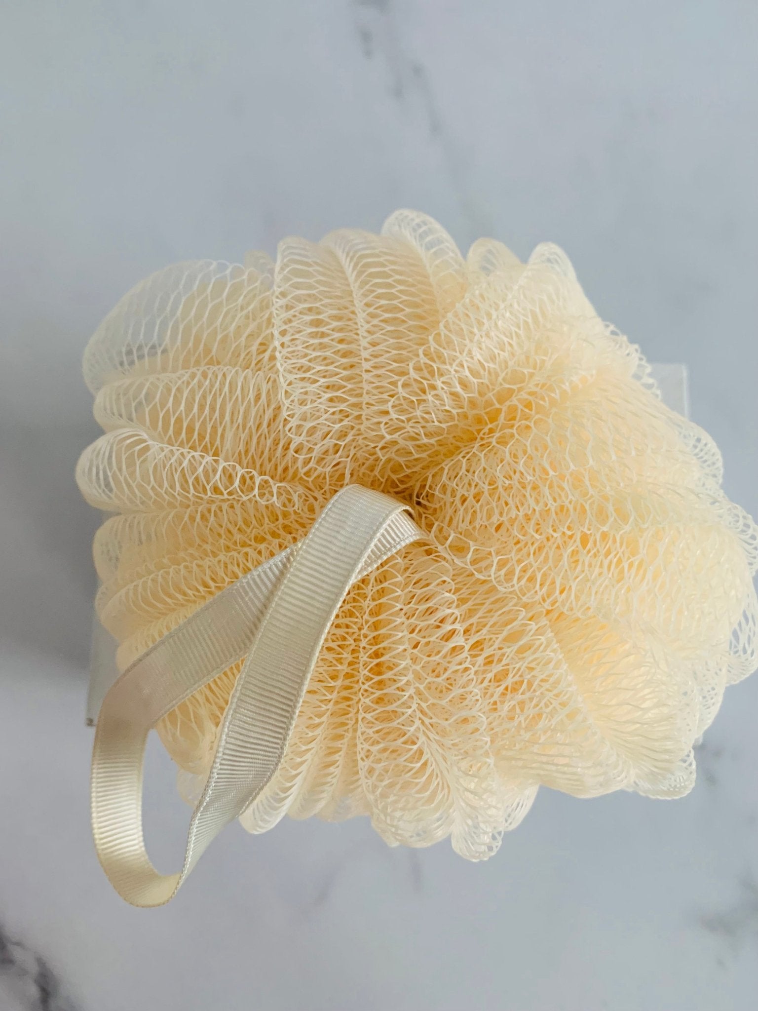 Mesh sponge, textured bath puff - Monika Botanika Inc.